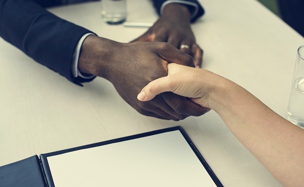 Business Contract Documents Handshake Concept